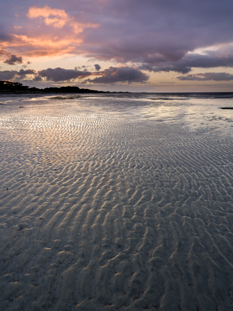 New Zealand, Nelson & Marlborough, Farewell Spit. Dawn at Farewell Spit, a narrow sand spit at the northern end of the Golden Bay.