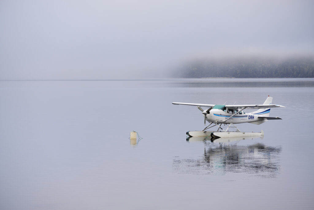 New Zealand, South Island, Fiordland National Park. Seaplane on a misty morning on Lake Te Anau - Gateway to Fiordland National Park.