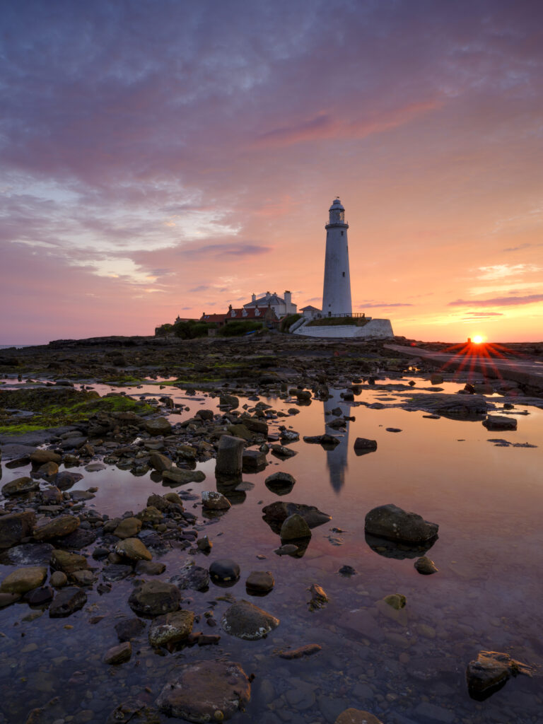 England, Tyne and Wear, Whitley Bay. St Mary's Lighthouse and Island photographed at dawn.