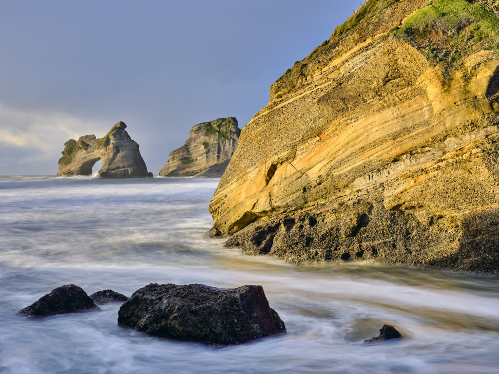 New Zealand, South Island, Wharariki Beach. Wharariki Beach and the the Archway Islands located near Cape Farewell and the Kahurangi National Park.