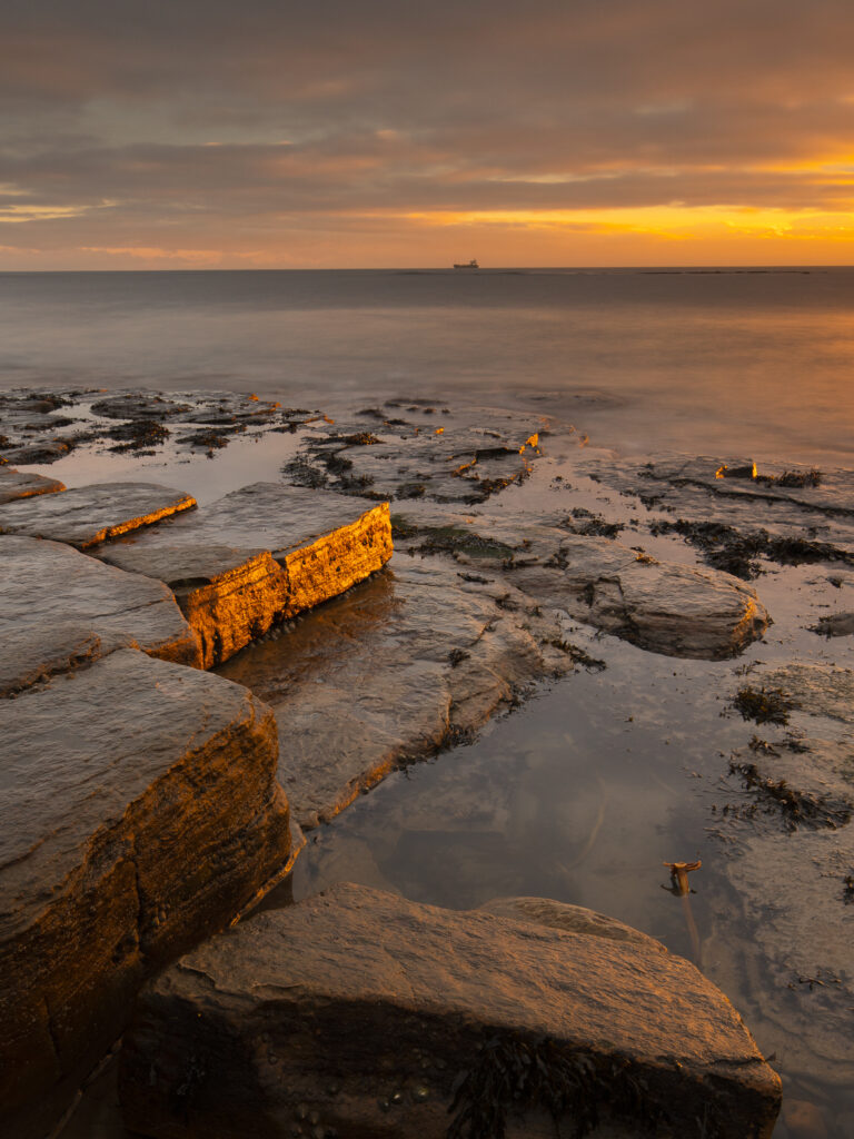 England, Northumberland, Old Hartley. Old Hartley Bay at dawn.