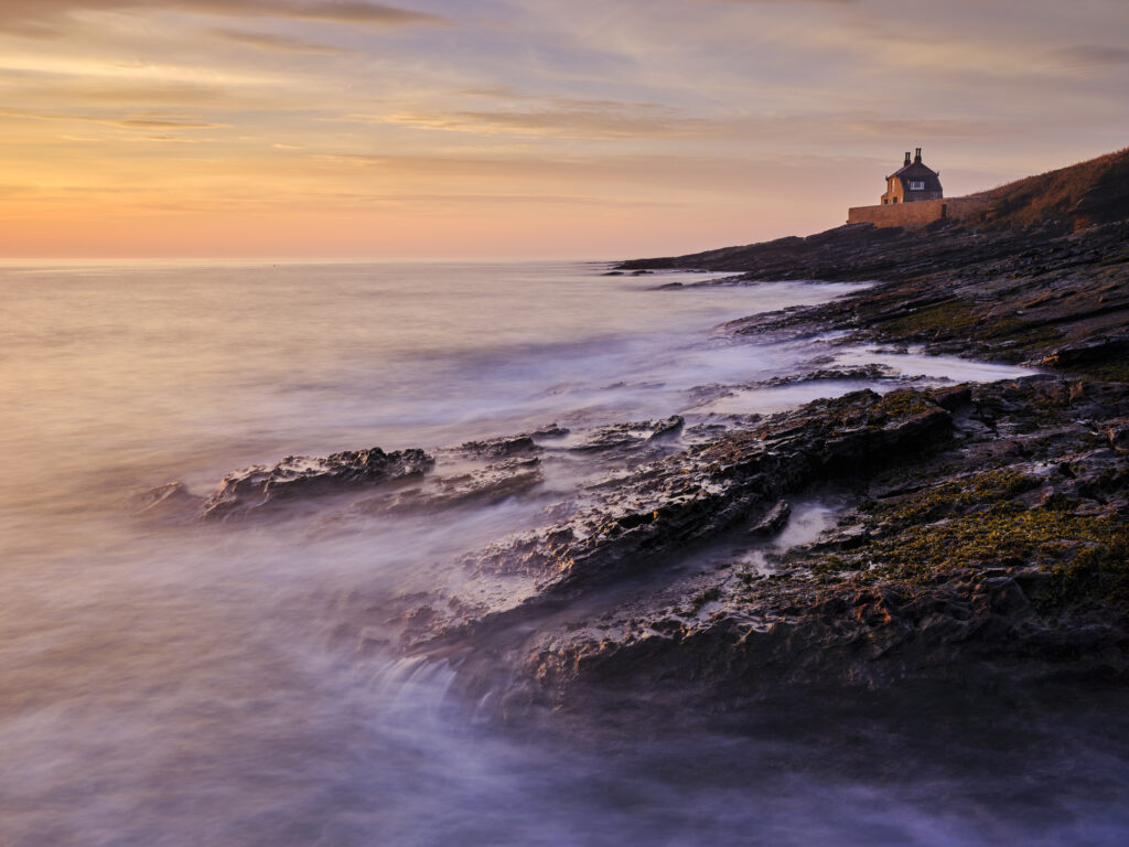 England, Northumberland, Howick Bathing House. Howick Bath House, on the Northumberland Heritage Coast, shortly after dawn.