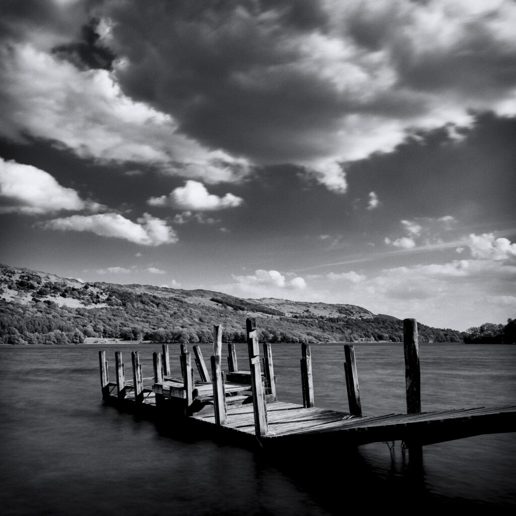 England, Cumbria, Lake District National Park. Sunny Bank Jetty on Coniston Water - the third largest lake in the English Lake District.