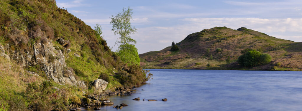 England, Cumbria, Lake District National Park. Beacon Tarn, located on Torver Common, a small lake found on the Cumbria Way long distance track.
