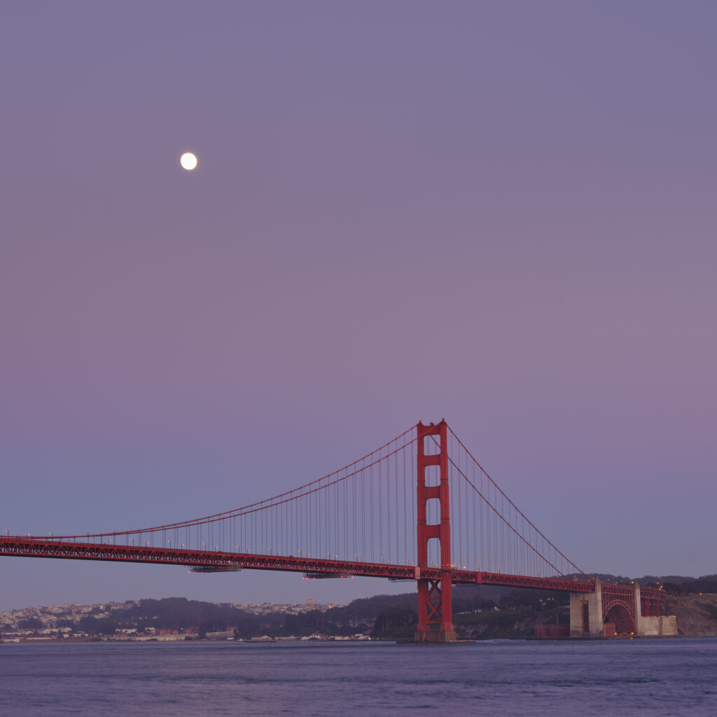United States of America, California, Golden Gate Bridge. The iconic Golden Gate Bridge in San Francisco viewed from Kirby Cove at dusk.