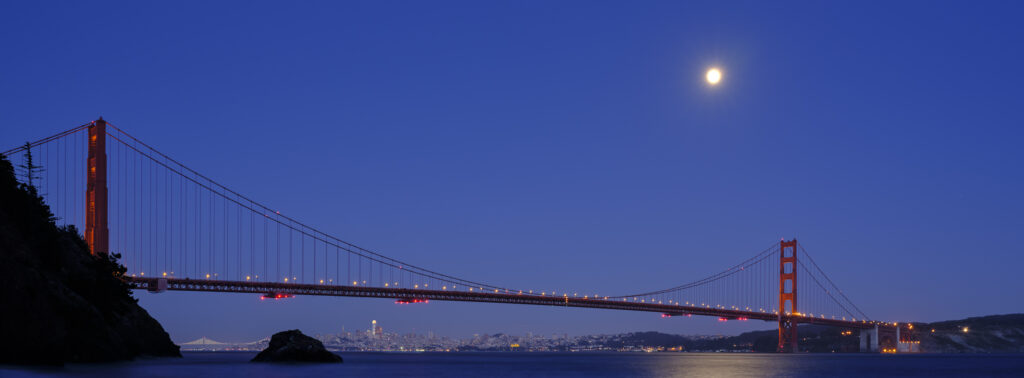 United States of America, California, Golden Gate Bridge. The iconic Golden Gate Bridge in San Francisco viewed from Kirby Cove at dusk.