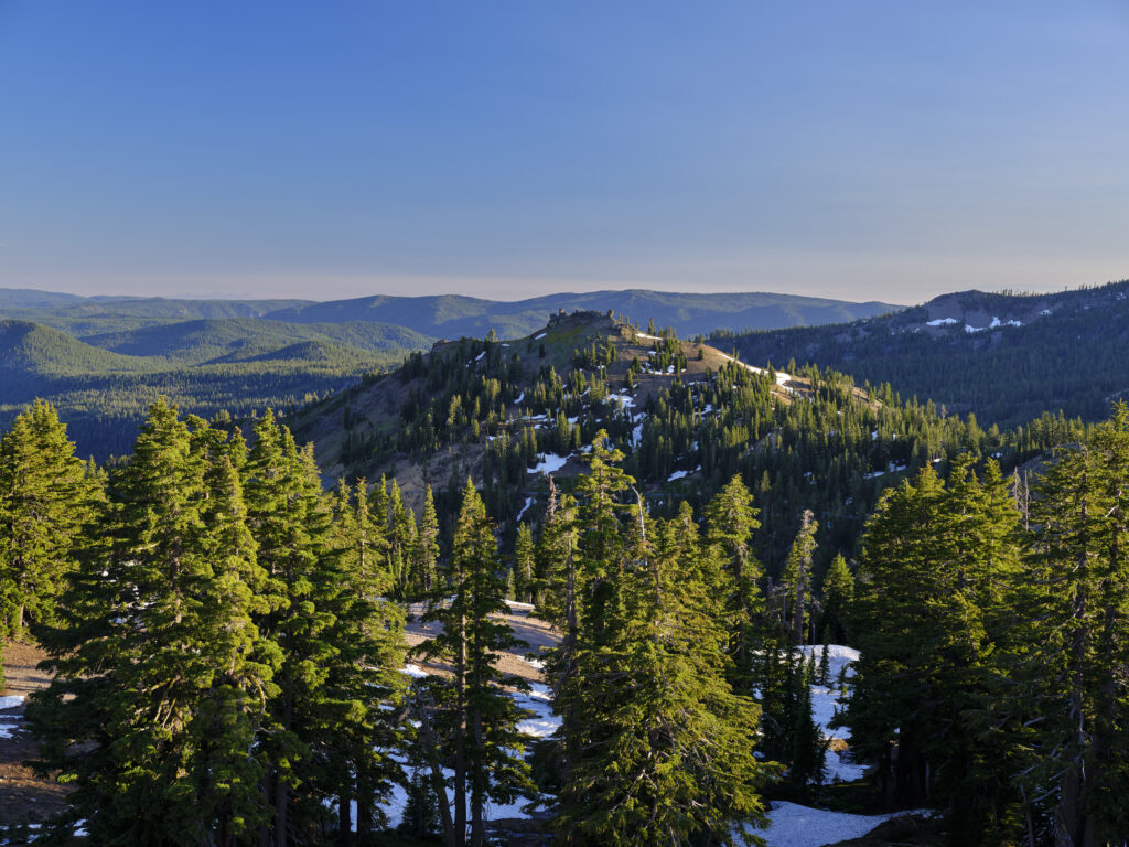 United States of America, California, Lassen Volcanic National Park. Spring snow remains in the wild landscape of the Lassen Volcanic National Park.