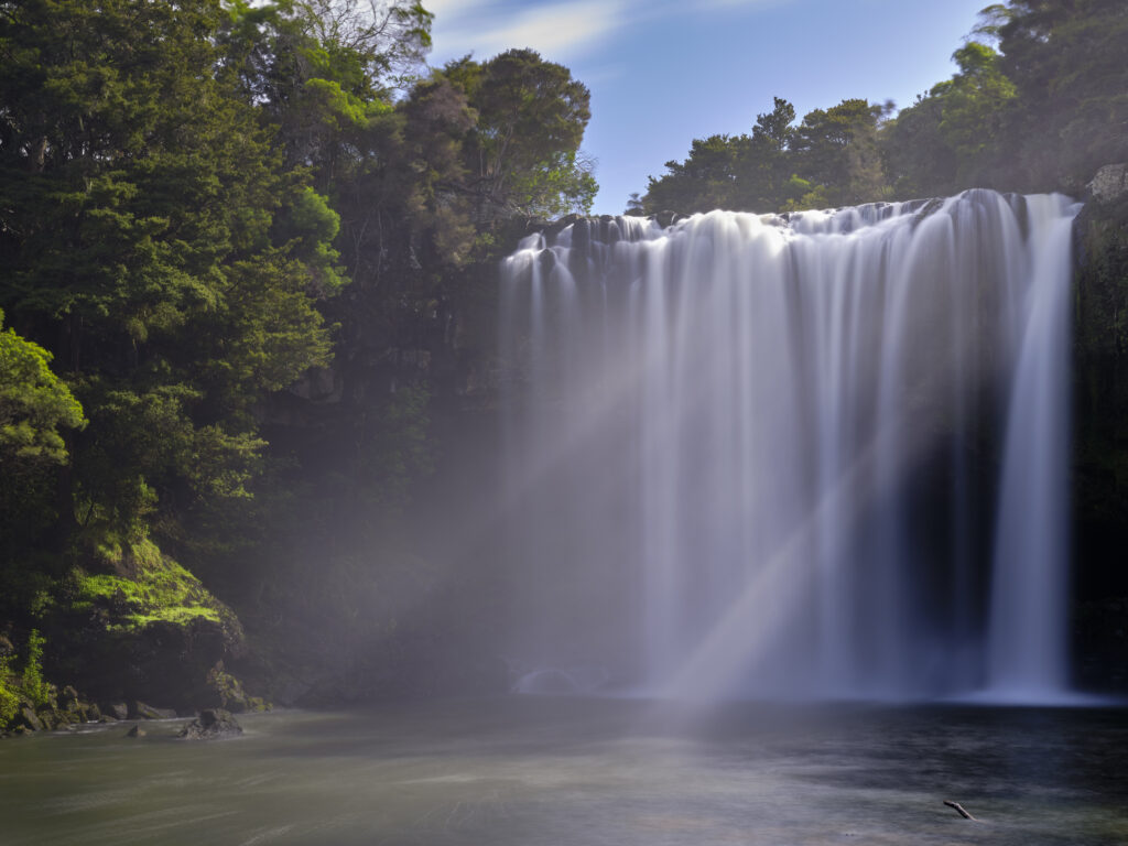 New Zealand, Northland, Rainbow Falls. Located near the town of Kerikeri, Rainbow Falls (Waianiwaniwa) are a single-drop waterfall on the Kerikeri River.