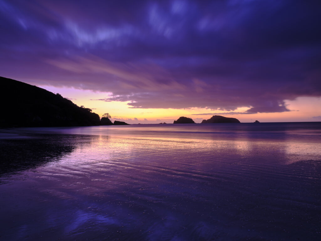 New Zealand, North Island, Matauri Bay. The picturesque Matauri Bay, near the Cavalli Islands - The final resting place of the Greenpeace Rainbow Warrior ship.