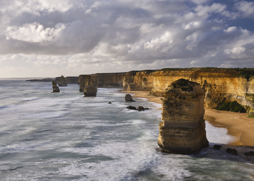 Australia, Victoria, The Twelve Apostles. The world famous Twelve Apostles limestone stacks located along the Great Ocean Road in Port Campbell National Park.