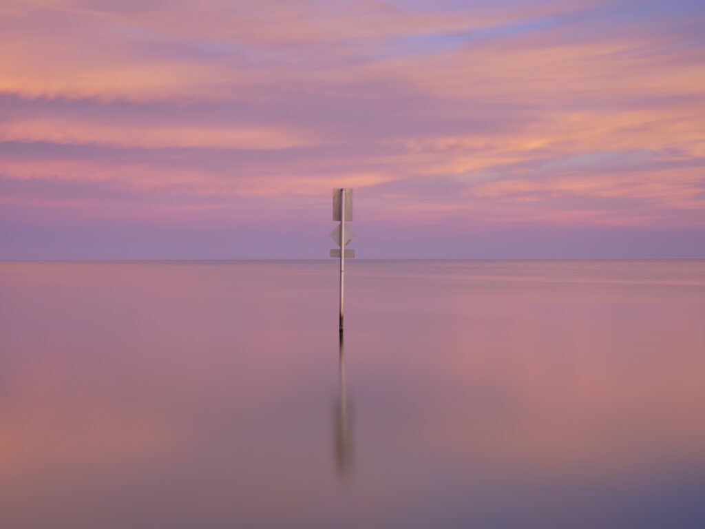 Australia, Southern Australia, Narrung Jetty Reserve. Submerged sign near the Narrung Jetty and the Lake Alexandrina Narrows.