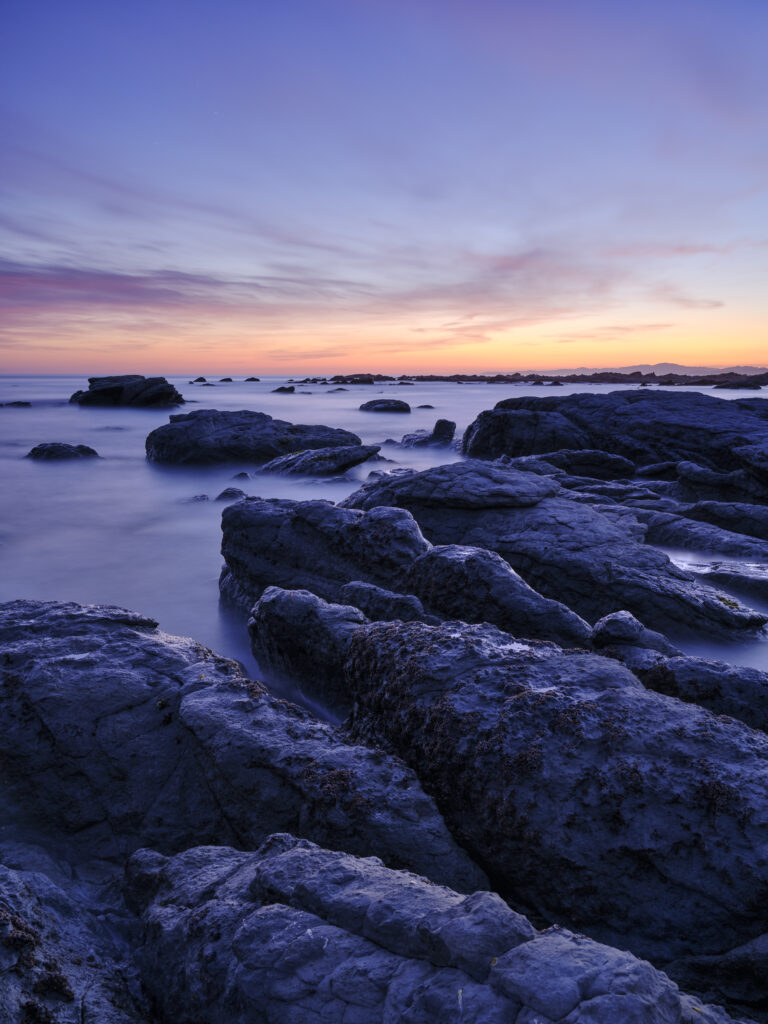 New Zealand, Marlborough, Kaikoura. Coastal limestone outcrops on the Kaikoura Pennisula near the town of Kaikoura.