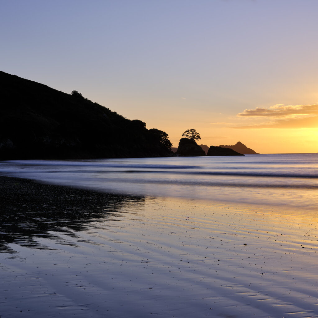 New Zealand, North Island, Matauri Bay. The picturesque Matauri Bay, near the Cavalli Islands - The final resting place of the Greenpeace Rainbow Warrior ship.