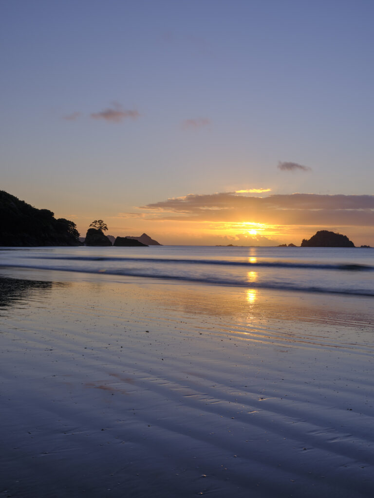 New Zealand, North Island, Matauri Bay. The picturesque Matauri Bay, near the Cavalli Islands - The final resting place of the Greenpeace Rainbow Warrior ship.