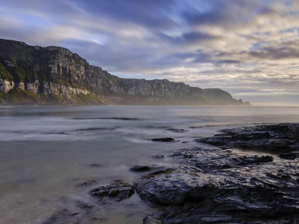 New Zealand, Southland, The Catlins. Early morning at Purakaunui Bay, a popular camping spot along the Catlins Coast.