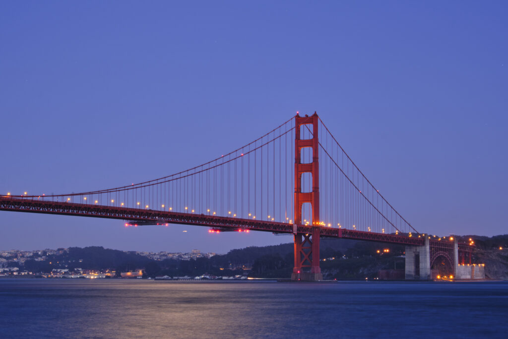 United States of America, California, Golden Gate Bridge. The iconic Golden Gate Bridge in San Francisco viewed from Kirby Cove at dusk.