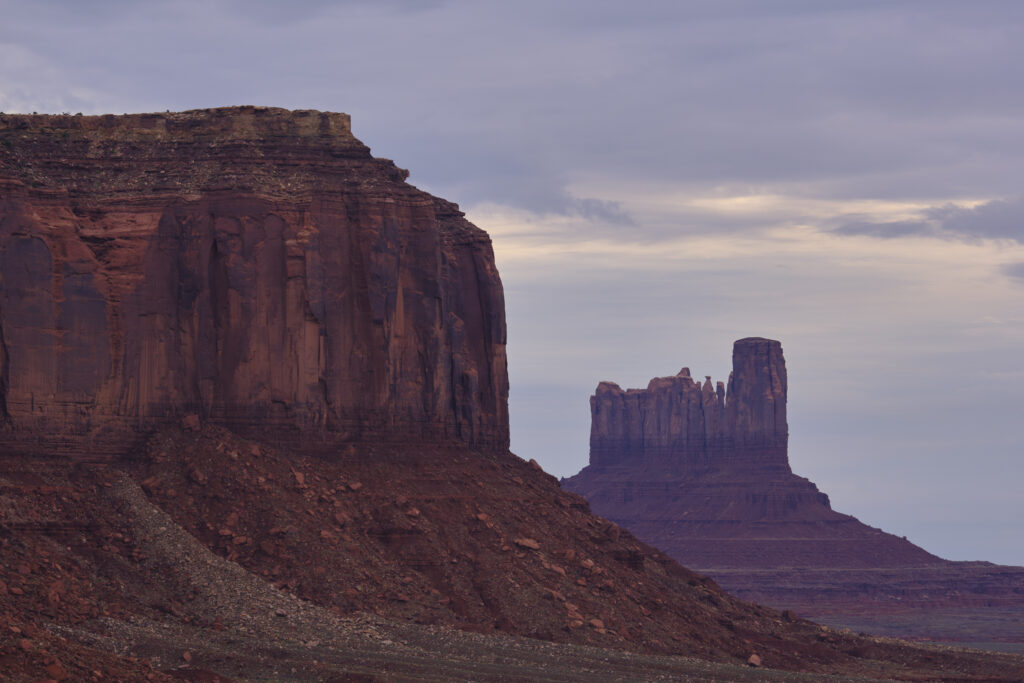 United States of America, Arizona, Monument Valley Tribal Park. The iconic landscape of the sandstone buttes of the Monument Valley Tribal Park located in the Navajo Nation straddling the Arizona / Utah border.