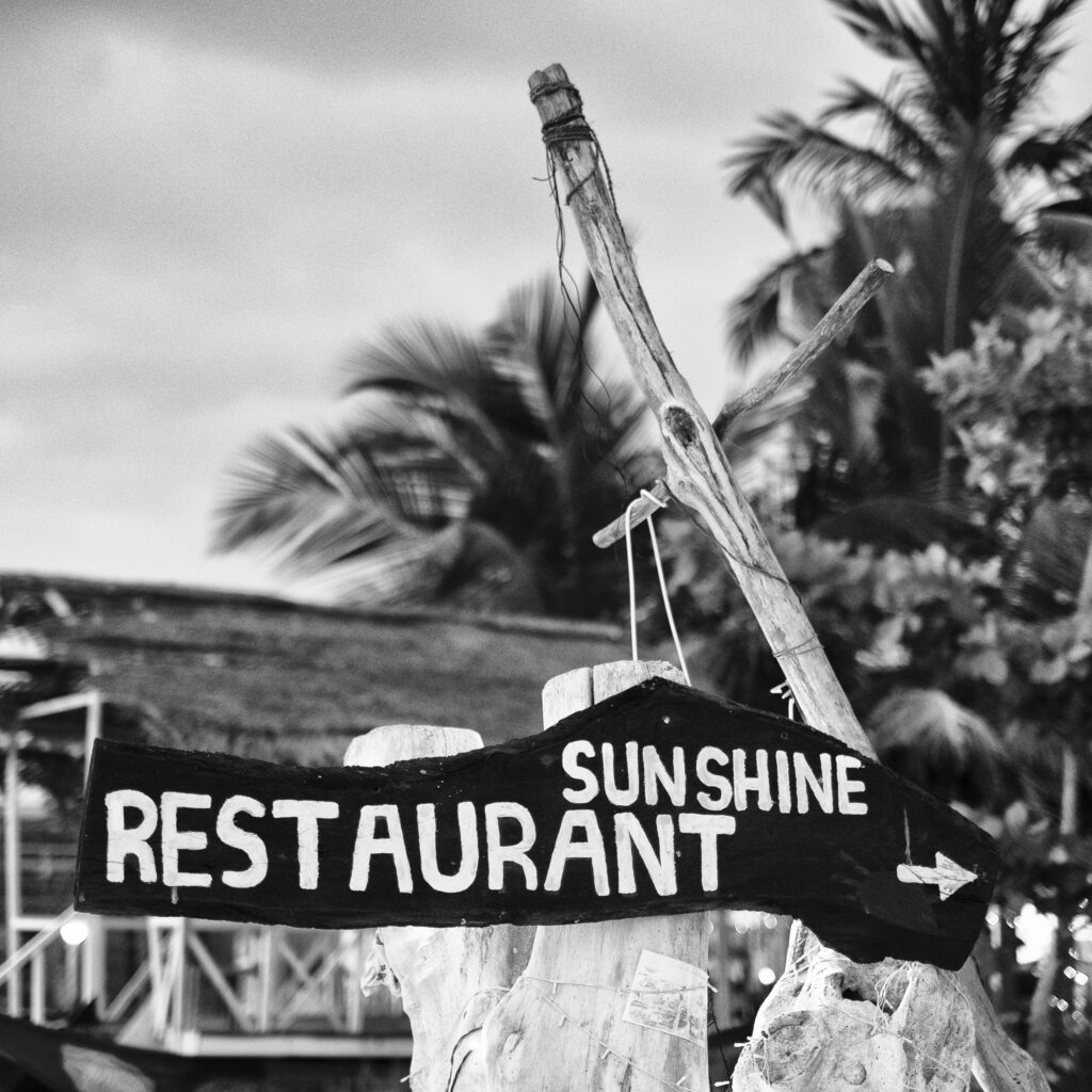 Sri Lanka, Galle District, Ahungalla. Bar and restuarant sign on Ahungalla beach.