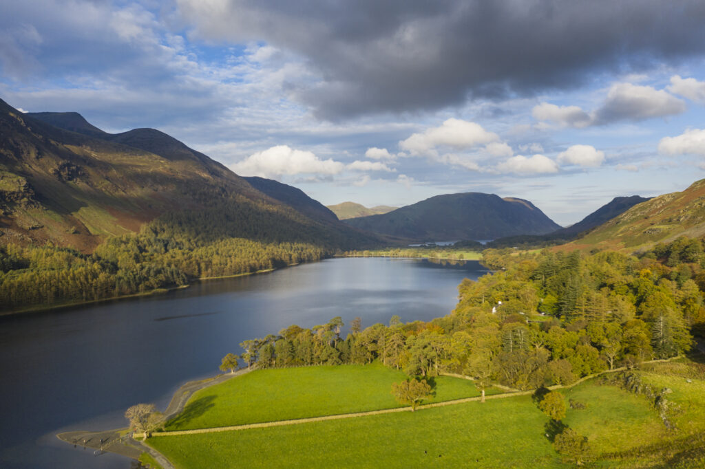 England, Cumbria, Lake District National Park. Aerial view of Buttermere lake looking towards Crummock Water shortly after sunrise on an autumn day.