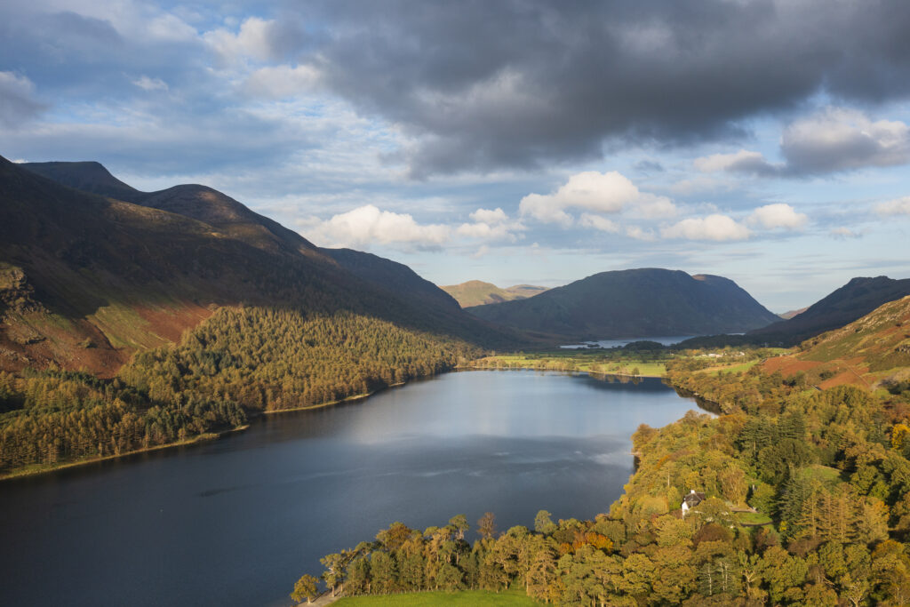 England, Cumbria, Lake District National Park. Aerial view of Buttermere lake looking towards Crummock Water shortly after sunrise on an autumn day.