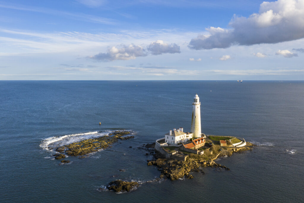 England, Tyne and Wear, Whitley Bay. Aerial view of St Mary's Lighthouse and Island and the North Sea.