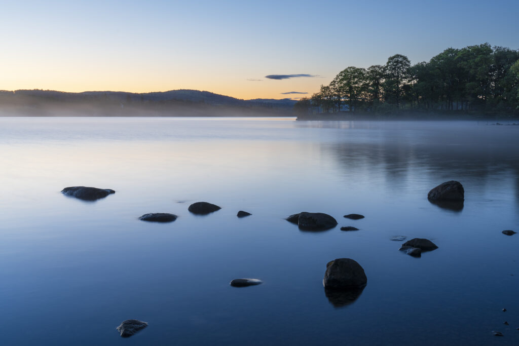 England, Cumbria, Lake District National Park. Sunrise at Low Wray on Lake Windermere near the town of Ambleside.