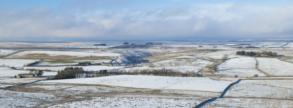 England, Northumberland National Park, Hadrian's Wall. View north of the wall from Caw Gap.
