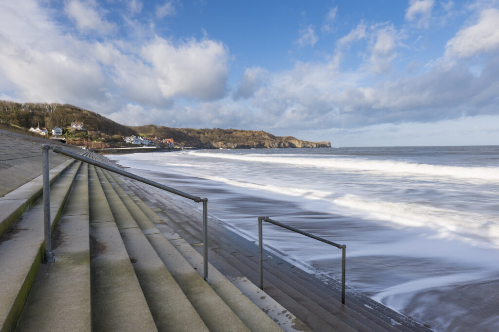 England, North Yorkshire, North York Moors National Park. The sea defenses of Sandsend, a small fishing village near Whitby.