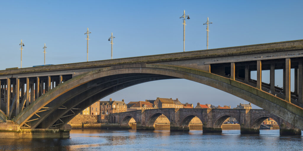 England, Northumberland, Berwick Upon Tweed. Berwick Old Bridge and Royal Tweed Bridge spanning the River Tweed.