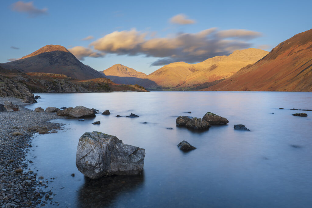England, Cumbria, Lake District National Park. After light illuminates Great Gable and the other mountains surrouding Wasdale, viewed from Wastwater - The deepest lake in England.