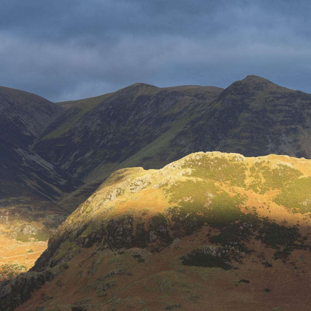 England, Cumbria, Lake District National Park. Breaking light on the mountains near Crummock Water and Buttermere.