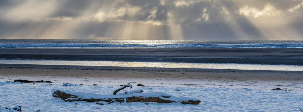 England, Northumberland, Alnmouth. Snow covered beach near the mouth of the Aln Estuary at Alnmouth.