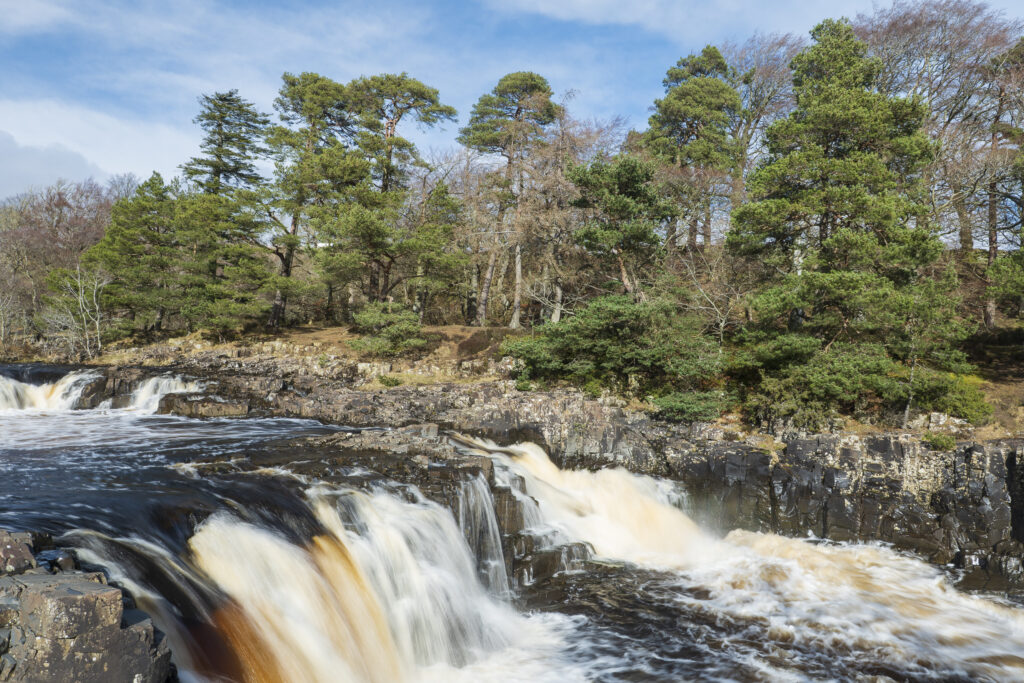 England, County Durham, Low Force. The River Tees cascades down the Low Force waterfall in County Durham.