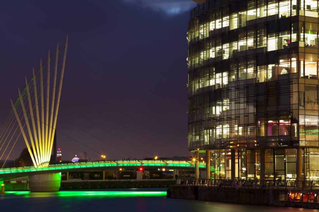 England, Greater Manchester, Salford Quays. Swing Bridge and Media City UK buildings located on the Salford Quays in the city of Salford near Manchester Old Trafford.