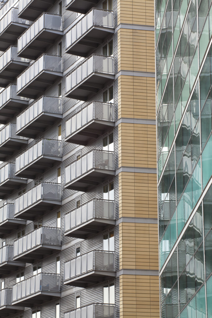 England, Greater Manchester, Manchester. Detail shot of the Bridge apartments on the banks of the River Irwell near the Trinity Bridge.