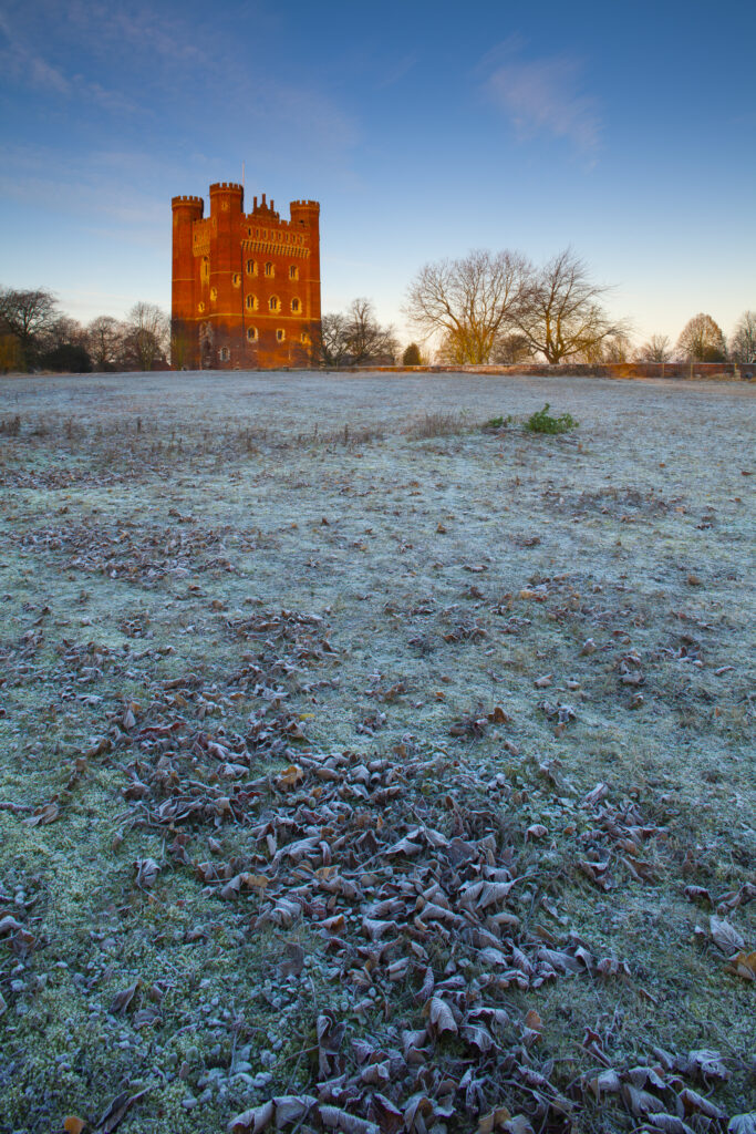 England, Lincolnshire, Tattershall Castle. Tattershall Castle, a red-brick medieval castle built by Ralph Cromwell, Lord Treasurer of England in 1434, on a frosty winters morning.