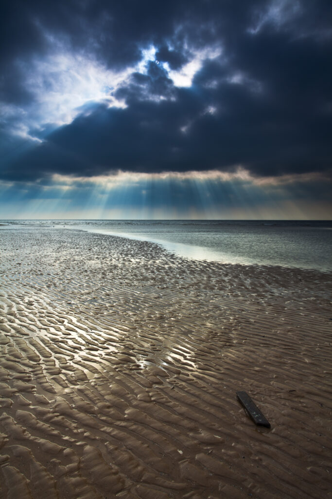 England, Lancashire, Blackpool. Dramaic light above the Irish Sea along the South Shore at Blackpool.