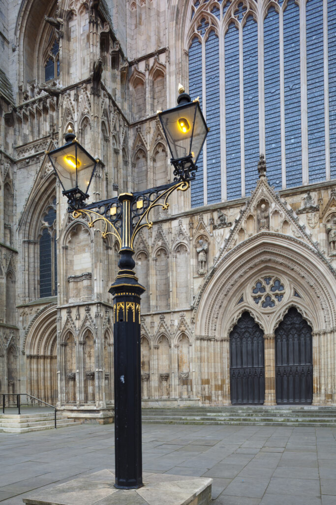 England, North Yorkshire, York City. Ornate lamp outside of the West Front entrance of York Minster.