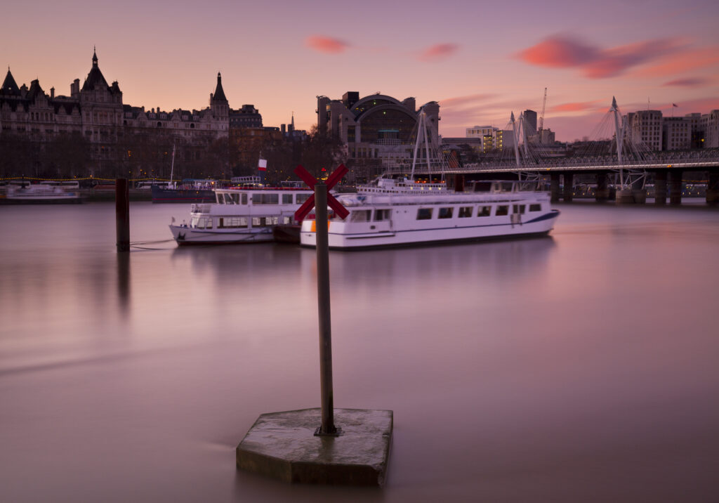 England, Greater London, London South Bank / River Thames. Looking across the River Thames from the South Bank to the Golden Jubilee Bridge