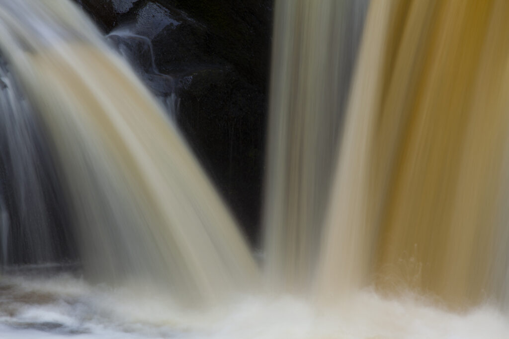 England, North Yorkshire, Ingleton. Abstract shot of the Pecca twin falls waterfalls in the Yorkshire Dales.