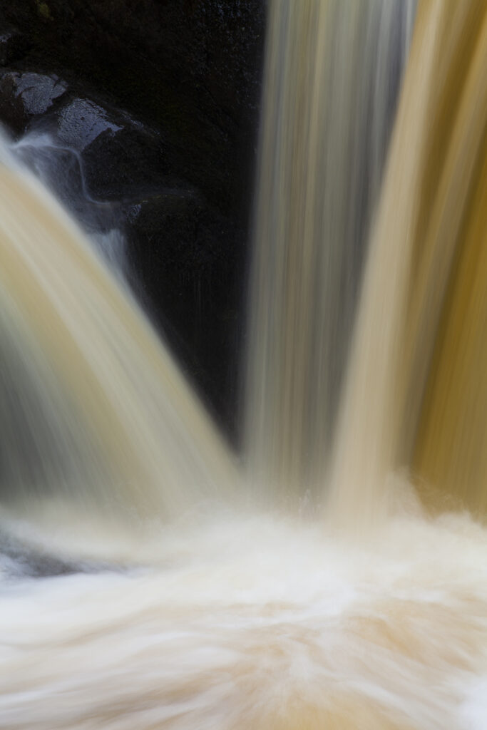 England, North Yorkshire, Ingleton. Abstract shot of the Pecca twin falls waterfalls in the Yorkshire Dales.