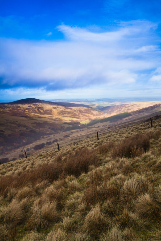 England, Northumberland, Northumberland National Park. Looking down towards the Harthope Valley, during a rain storm, from the upper slopes of the Cheviot Hills.