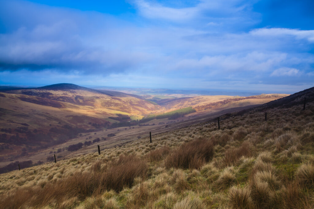 England, Northumberland, Northumberland National Park. Looking down towards the Harthope Valley, during a rain storm, from the upper slopes of the Cheviot Hills.