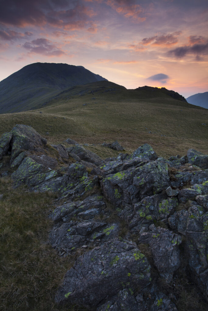 England, Cumbria, Lake District National Park. Sunset behind the mountain peak known as Pillar in the north western lake distict.