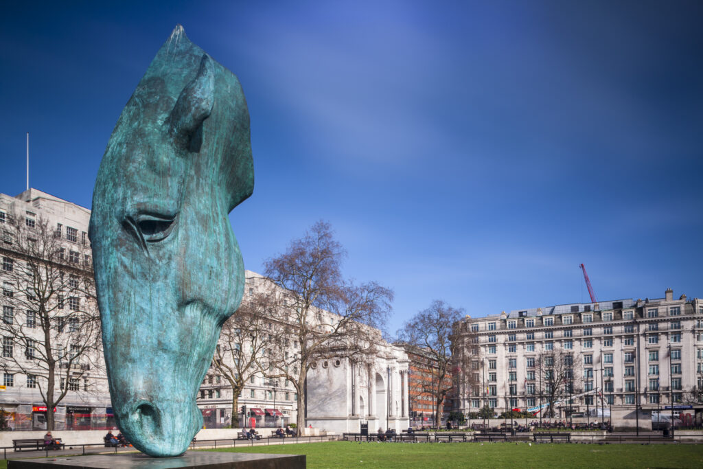 England, London, Marble Arch. 6 tonne, 27 feet tall, half inch thick, bronze Marwari Horse Head sculpture by Nic Fiddian-Green located at Marble Arch.