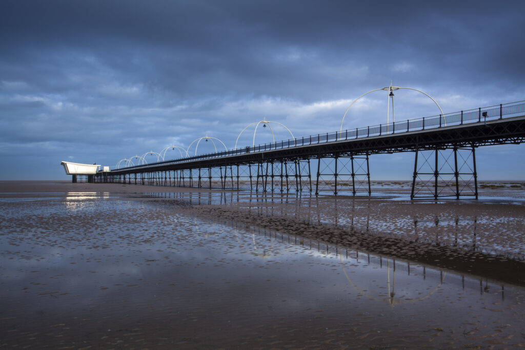 England, Merseyside, Southport. Southport Pier at dawn.