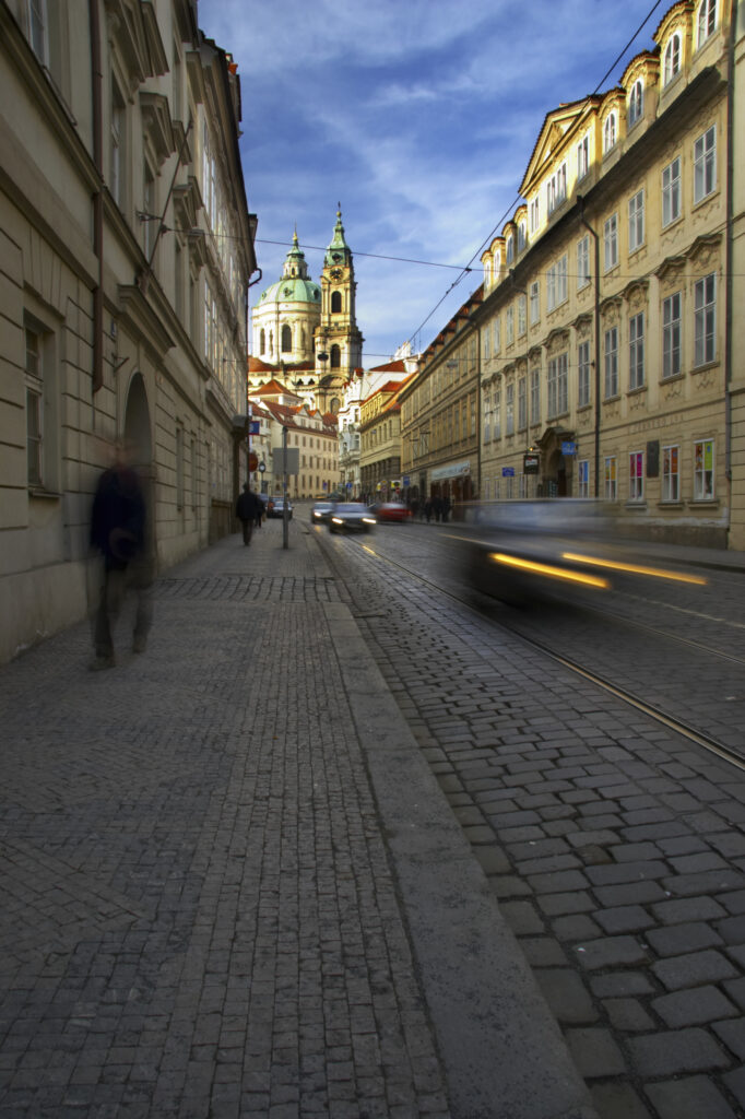 Czech Republic, Prague, Mala Strana . Typical Prague architecture and the st. Nicolas Church at Malostranske Namesti