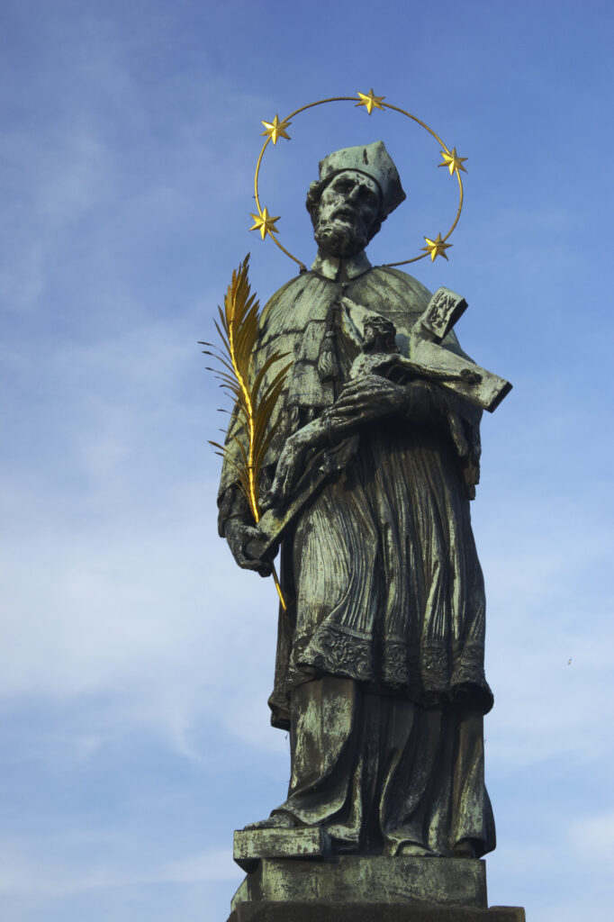 Czech Republic, Prague, Charles Bridge. Gothic statue / monument on the popular Charles Bridge of Prague city.
