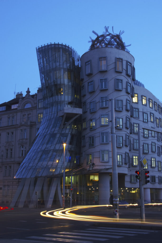 Czech Republic, Prague, Fred and Ginger Building. Cityscape scene at dusk of the Fred and Ginger commercial building. The Fred and Ginger building in Prague was built in 1996 and designed by Frank O Gehry. The design resembles a dancing couple.