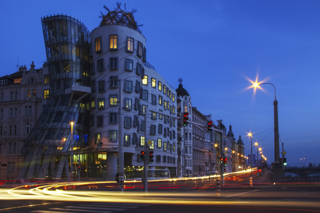 Czech Republic, Prague, Fred and Ginger Building. Cityscape scene at dusk of the Fred and Ginger commercial building. The Fred and Ginger building in Prague was built in 1996 and designed by Frank O Gehry. The design resembles a dancing couple.